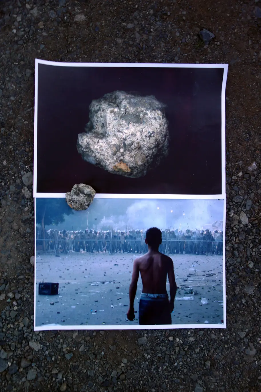 “Stone and Reference: Stone Throwing”. Stone, photograph print on paper. 2018. Photograph: Arab Spring, Tahrir Square, 2011