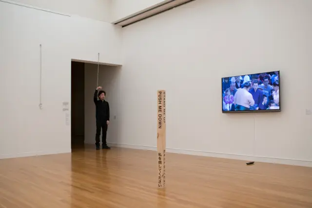 Exhibition view of three works: "Hanging the Handcuffs", "Push me down/ Stand me up" and "Hanging the Handcuffs", Museum of Contemporary Art Tokyo, 2016