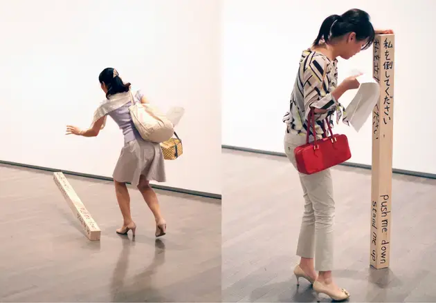 “Push me down/Stand me up”. Wood, instructions, visitors. 2012. National Museum of Modern Art, Tokyo