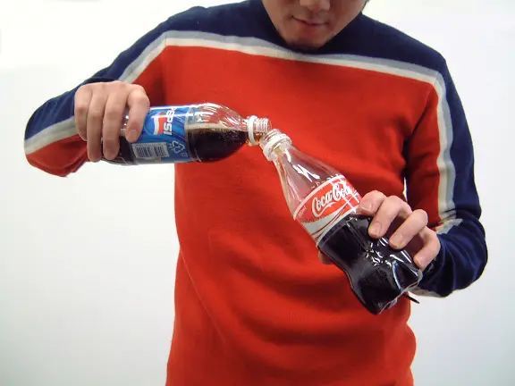 Pepsi and Coca-Cola. 2003. Pepsi(1.5L bottle) Coca-Cola (1.5L bottle).  size：dimension variable